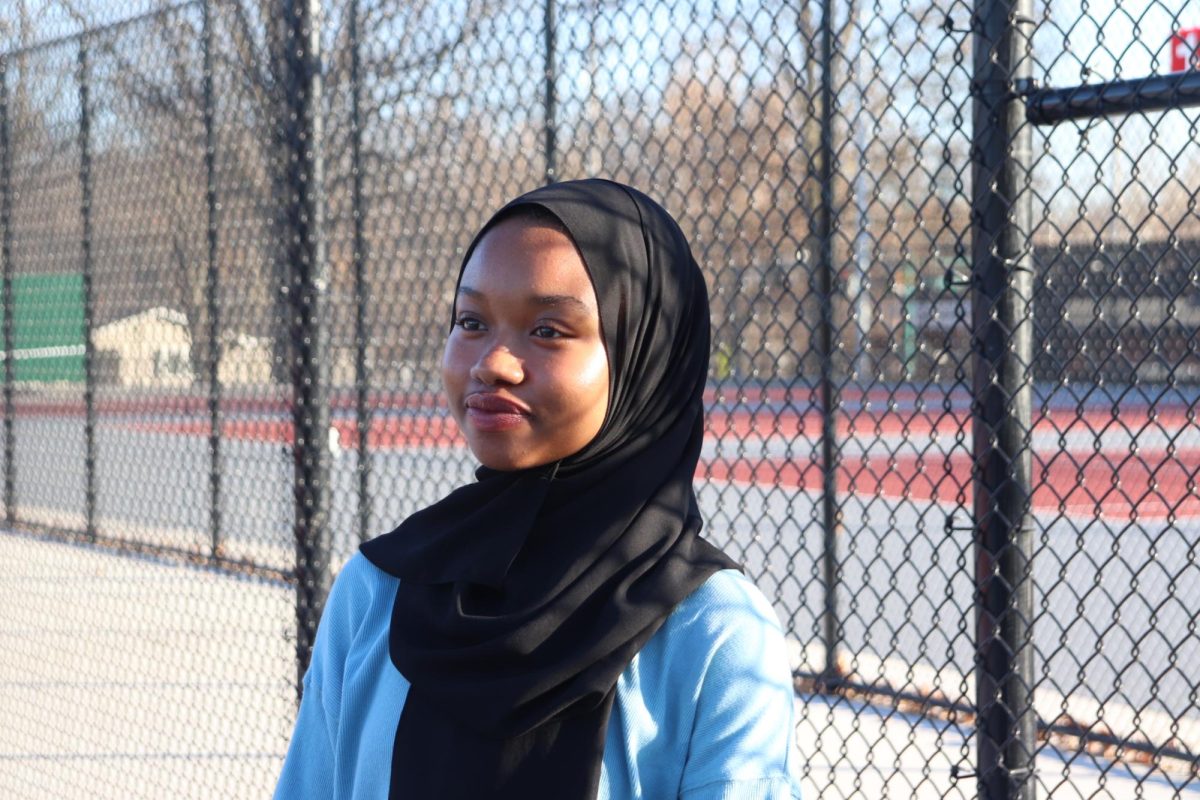 Hassanatou Diallo 24 had her senior pictures taken at the City tennis courts. Photo courtesy of Hassanatou Diallo