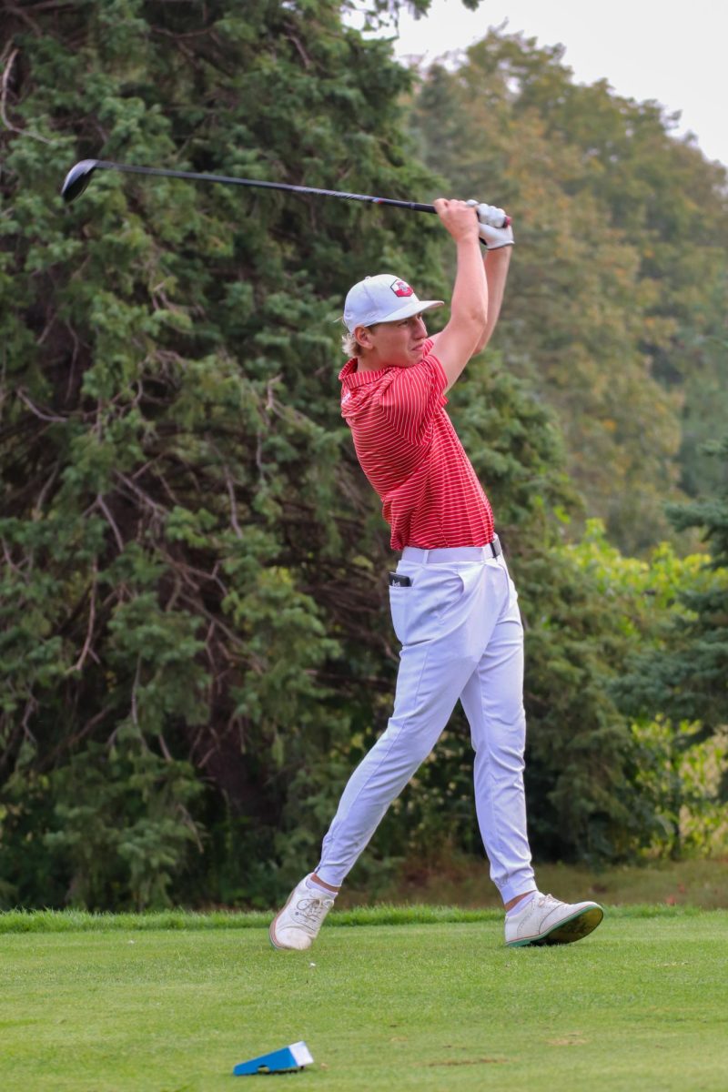 Henry Birt '27 takes a long backswing after sending a drive straight towards the green. This was Henry's final hole of the day, securing a par to shoot a 39 in the meet. Talking to Henry afterwards, he said, "This wasn't my best performance, but next time I'll come back stronger".