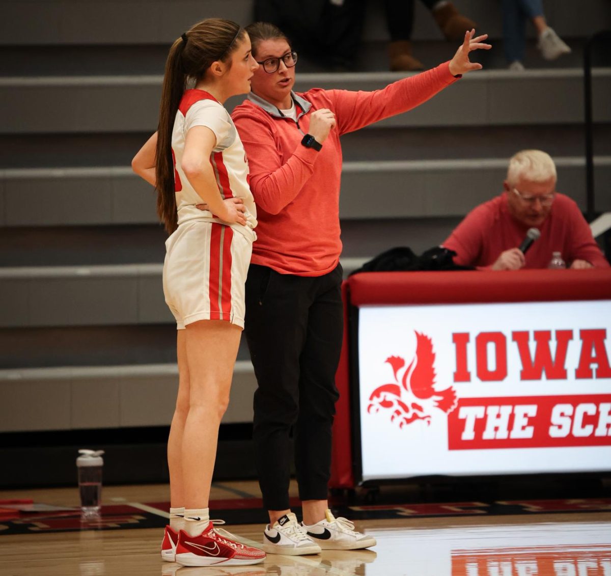 Coach Barnard gives advice to her point guard last season. 
