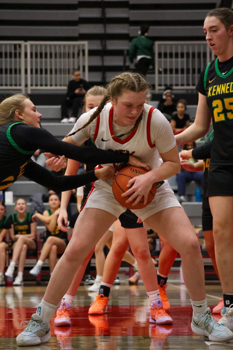 Kaitlin Loria fights for control over the ball in the paint, drawing out a foul. You can always count on Kaitlin being under the rim.