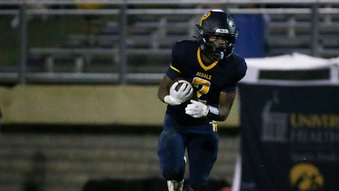 Savion Miller runs with the ball during a game with Regina in his sophomore season. 