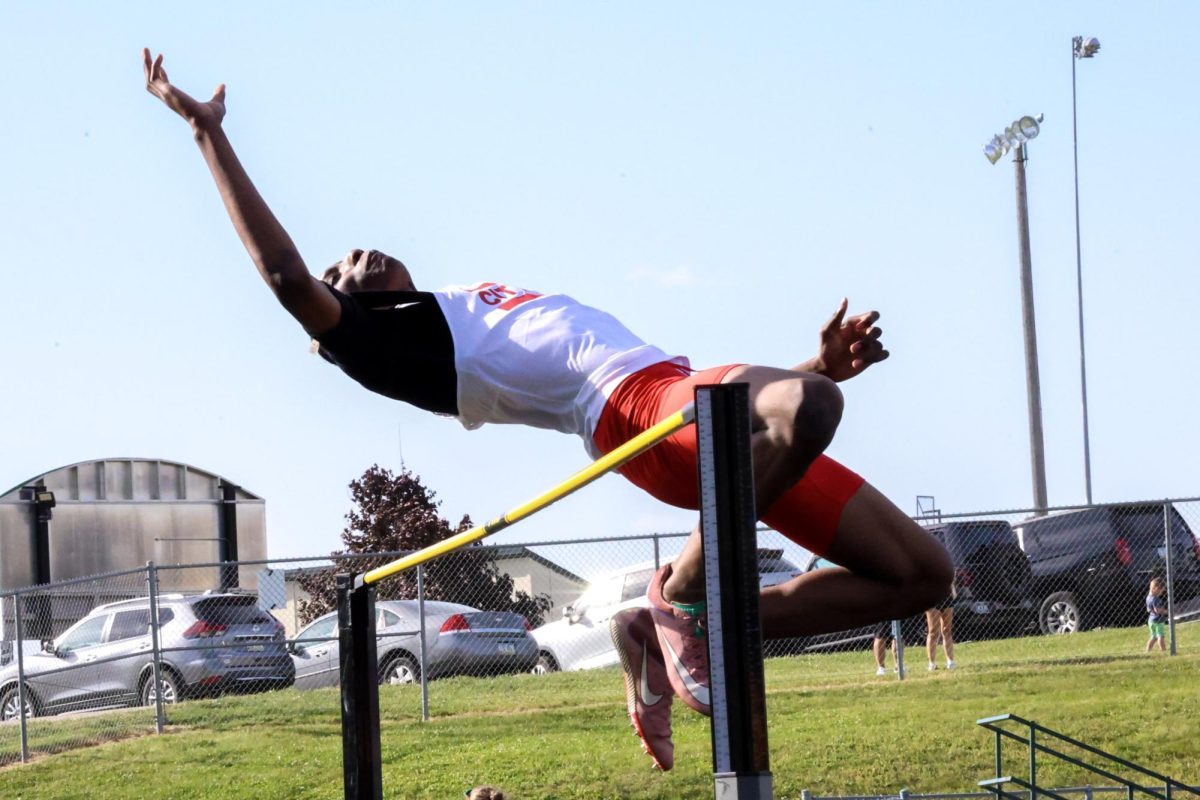 Adams Kane '26 performing his high jump in the teams final meet last season. 
