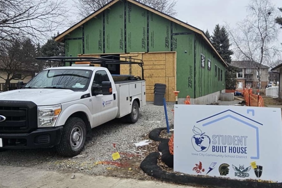 Students in the Student-Built House Program build a real house 