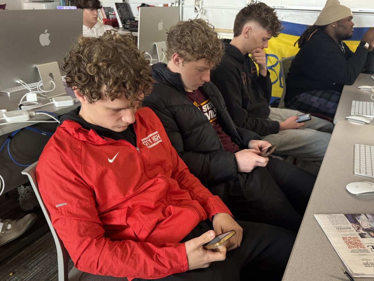 Banning phones during the school day would increase student engagement and learning.