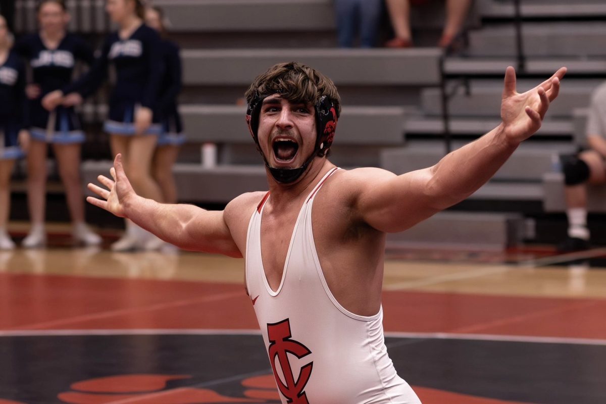 Willey, 26' Celebrates after becoming a district champ at the 285 pound weight class.