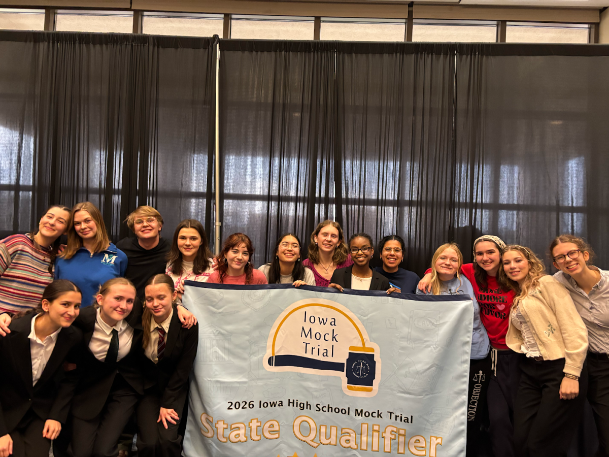 The City High mock trial teams pose at St. Ambrose University after both the junior and senior teams qualified for state. 