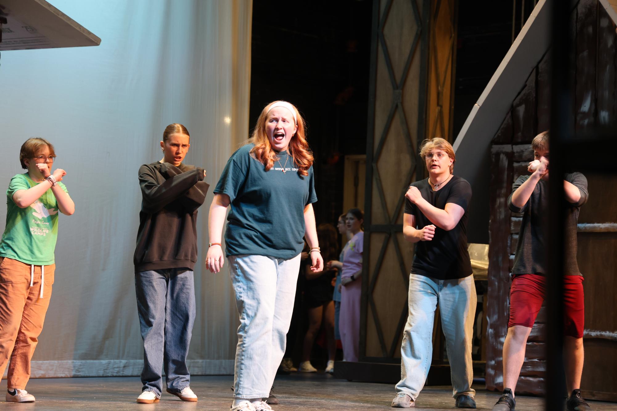 Clara Meehan '26 sings about being a monster as Arendelle's forces surround her